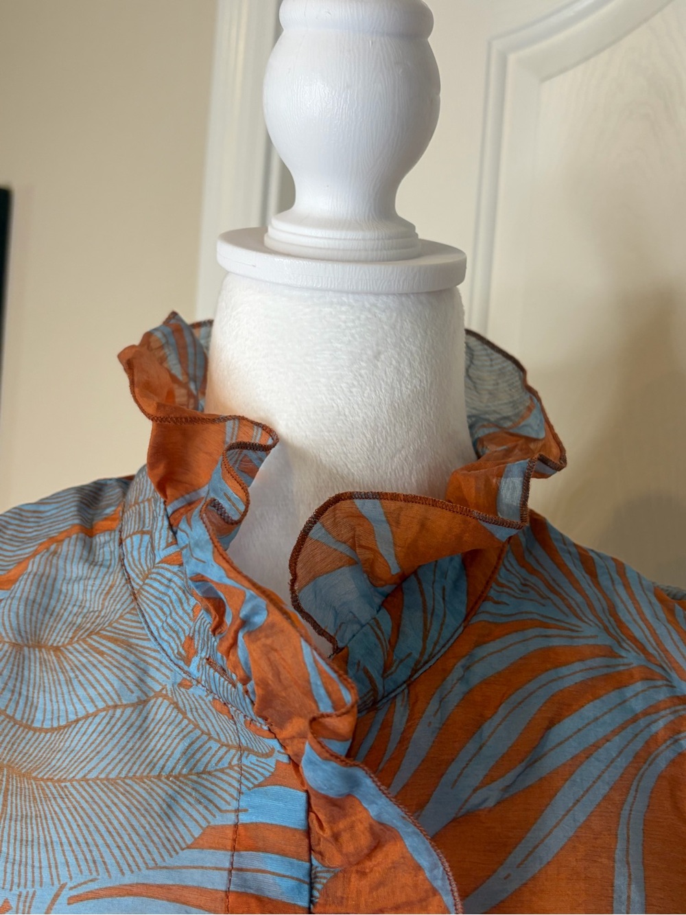 CAbi Sheer Blouse in Rust & Slate Blue Tropical print. - Picture 2 of 8